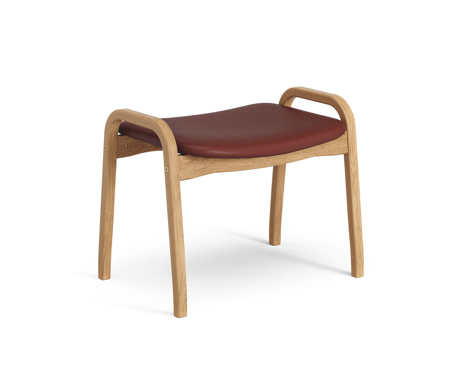 Lamino Fotpall. Här visad i oljad ek, med läder Baltique 93347.